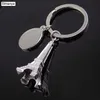 Keychains Lanyards 2pc / lot Vente chaude Torre Eiffel Tower Car Key Ring Men and Women Keychain Car Souvenirs Paris Tour Chain Pendant # 17161 Q240403