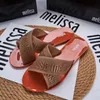Sandálias de designer feminino Luxury Melissa Sapatos de sandálias planas lenhas de letra de letra de letra de solteira de chinelos slippers rosa Plataforma de praia de praia