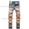 Designer Herren Jeans schwarzer Riss für Herrenhosen schlanker Mann Stickerei Patchwork Rock Revival Damen Damen Skinny Motorcycle European Loch Orange Jeans Jeans