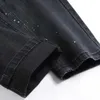 Мужские джинсы мужские хрустальные черные джинсовые джинсы Многоцветные пятна работают упругие брюки.