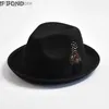 Brede rand hoeden emmer heren wollen blend fedoras hoed en veer Britse stijl trilby jazz panama feest bruiloft sombreros de mujer yq240407