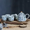 Ensembles de voies de thé Ensemble de tasse de kungfu de kungfu en céramique bleu en sous-brillant floral avec cadeau d'infuseur (4 tasses à thé 1 pot)