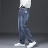 Mäns jeans les aires smala elastiska lösa raka benbyxor trendiga stora avslappnade