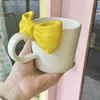 Tasses Creative Water Cap Bow à noeudpier en céramique tasse nordique tasses à café avec gros morceau de jus de céramique de couleur manuelle