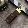 Fashionabla designerstil Lyxiga nyckelhållare Tillbehör Designer Floral Canvas Keychain Car Key Chain Ring