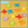 New New 12-24Pcs Jumping Frog With Bucket Bounce Fidget Toys Kids Novelty Stress Reliever Birthday Gift For Boys Girls Party Favor Game