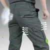 Pantalons de chargement tactique militaire de l'armée Men Impermétroofrant le pantalon long houstoux et le pantalon long mâle à pantalon mince et mince mâle 240403