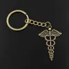 Keychains Lanyards New Fashion Mens 30mm Keychain DIY Metal Bracelet Vintage Caduceus Medical Symbol 49x30mm Silver Pendant Gift Q240403