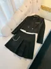 Spring Black Rhinestone Due abiti Set di abiti a manica lunga Blazer singolo a taglio a coglione top + gonna corta con tasca alta set da due pezzi D3N237424