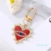 Rhinestones Pearl Evil Eyes Keychains Alloy Men Women Peach Love Heart Devil's Eyes Bag Car Keychain Pendant in Bulk