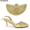 Zapatos de vestir último diseño damas italianas y juegos de bolsas decoradas con sandalias de correa de hebilla de diamantes de imitación tacones elegantes