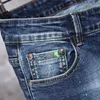 Jeans masculin pour hommes jeans chinois Style chinois brodé graffiti street trous hip-hop ultra-mince pantalon denim effilé