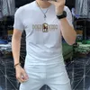 Nouveau 2024 Mens Designer T-shirt Hot Drill Letter Étiquettes Qualité de la mode à manches courtes hommes et femmes courts t-shirts Modèles Cotton Luxury Men Hip Hop Vêtements M-5xl