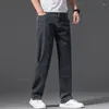 Jeans masculin été mince pantalon élastique décontracté en denim décontracté classique gris et pantalon de taille de taille de marque 42 44 46