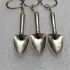 Keychains Lanyards En ny mini Shovel Key Chain Metal Key 3D Metal Tool Souvenir Trinka Q240403
