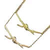 Collier torsadé de marque de marque Gold High Edition 18K Placage de rose Nouveau avancé de la clavicule de pendentif à l'arc de la mode avancée avec logo
