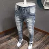 Jeans masculino designer de moda masculino jeans retro azul claro elástico slim fit impressão jeans rachada calça calças retro calças retro hombrel2403