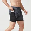 Männer laufende Shorts Schnelltrockne Fitness schwarze Doppelschurne Männer Neue Sporttraining-Training Bodybuilding Short Hosen