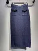 Kvinnors stickor tidigt på våren Navy Blue Checkerboard Round Neck Sticked Top/samma stil Mid-Längd kjol Kvinnor