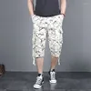 Pantalon masculin 2024 Vêtements Summer Poucles imprimées bouton de mode épissé de mode lâche résistant camouflage de coton pur capri