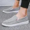 Lässige Schuhe Frühling Herren -Leinwand Pedal Slip auf massiven Herren -Sneakers atmungsaktiven Gummi -Männchen Flach