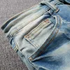 Męskie dżinsy męskie skórzane plastry celebrytów dżinsowe ubranie uliczne Slim Elastyczne dżinsowe spodnie ołówki Eyety Patche Zakryty spustowe 2403