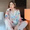 Hemkläder minimalistisk casual wear kvinnor blommor veckade hem långärmade byxor pajamas fashionabla cardigan