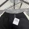 Correct 24SS Nouveau produit Broderie étiquette de ruban Shorts à crampons confortables et de soins de la peau à la mode pour hommes et femmes