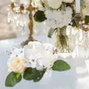 Decoratieve bloemen bureaubladdecor feestkrans taps toelopende kaarsen huwelijksbenodigdheden ringen pilaren slingerhangende decoreren