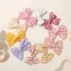 Accessori per capelli 10 pezzi/lotto dolce bowknot clip per la stampa in cotone morbido panoramici per le capelli cucite fresche per bambini.