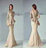 2018 Champagne Mermaid Evening Dresses Sheer Neck Long Sleeve 3D Floral Lace Applique Peplum Ruffles Plus Size Dubai Arabic Party 3421530