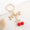 Keychains Lanyards Lovely Crystal Red Cherry Fruit Plant Key Rings for Women Girls Friendship Gift Handbag Decoration Handgjorda smycken Q240403