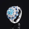 Exquisito gioielli di moda: anello d'argento S925 con bellissimo design fiore topazio blu