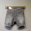 Homme Shorts denim Gray Ripped Pantalon Jeans pour hommes Stretchable avec Zipper Y2k Disté xl Cowboy Summer Haruku 240401