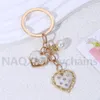 Keychains Pretty Heart Pearl Keychain Elegant Love Wing Key Ring Friendship Gift for Friend Bag Decoration Handgjorda DIY smyckesuppsättning