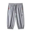 Casual Shorts 2024 Mens Summer Slim Loose Mens Sports Pants Trend mångsidig snabb torkning av andningsbara beskättade byxor