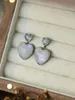 Boucles d'oreilles étalon 2024 European et Américain 925 Love en argent sterling incrusté de Moonlight Stone polyvalent frais