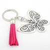 Keychains lanyards 1pc djur charms tofsar keyring fjäril hänge nyckelkedja för kvinnor juveler q240403