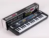 Multifunctionele mini -elektronische piano met microfoon plastic buik kinderen draagbaar 37 sleutels digitale muziek electone toetsenbord cadeau6588841