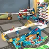 Elektrische rail auto dinosaurus gebouw parkeerplaats avontuur racen speelgoed kinderen hersenen mechanisch interactief 240314