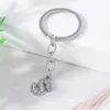 Keychains Lanyards Charme à la mode 26 Lettre anglaise A-Z Keychain Crystal Rimestone Alloy Keyring Handsbag Bijoux DIY DIY Q240403