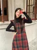 Robes de fête de style preppy style femme écossais de robe écossaise printemps automne en laine plaid manche volante noire pliant mince élégant