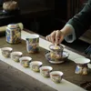 Ensemble de thé en gage portable chinois Porcelaine de luxe Porcelaine traditionnelle tasses japonaises vintage théières jogo de cha porcelana yyy35xp