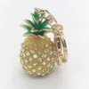 Llaves de llaves de piedra coloreada piña llavero hombre fruta brillante fruta de oro circular llaves para mujer regalos de joyería exquisita Q240403