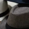 Brede rand hoeden emmer hot verkopen mode unisex str fedora zon hoed panama trilby opvouwbare heren reisgordel yq240407
