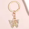 Keychains Lonyards Animal mignon Keychain Hollow Butterfly Crystal Key Ring Enamel Chains Souvenir Cadeaux pour femmes hommes BIEUX MAIN MAIN Q240403