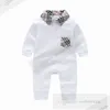 Vår spädbarn barngitter rompers nyfödda pojkar flickor lapel långärmad jumpsuits designer babykläder bomull mjuk z7536