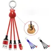 Trois en un portable de guitare portable Keychain Lumin LED lumineux pour la charge de téléphone mobile avec trois câbles de données