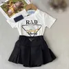 New kids designer clothes girls overskirt baby tracksuits Size 90-150 CM Short sleeved T-shirt and black short skirt 24April