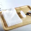 Serviette épaissie de coton doux de haute qualité jetable une fois utilise une tablette magique comprimé visage pour voyager